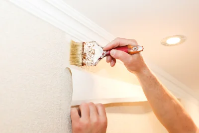 Pose de papier peint à Banios — revêtements muraux et toiles de verre
